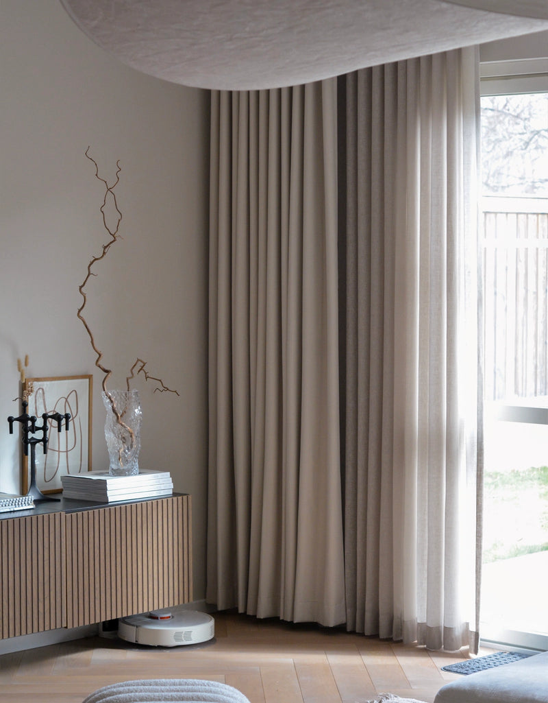 Double beige curtains, Saga and Nova, in a living room