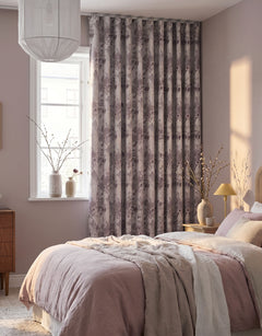 Room-darkening, floral curtain in pink tones